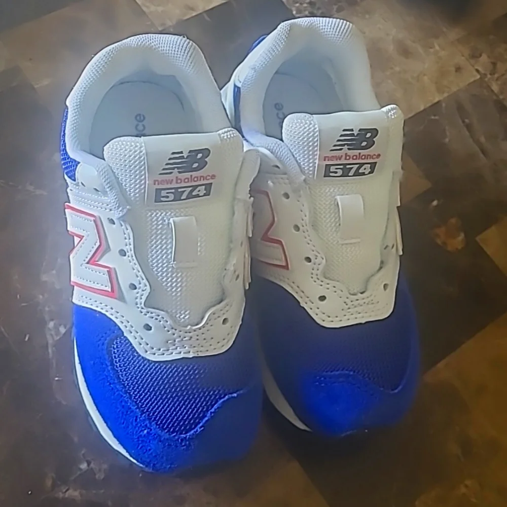 New Balance 574 Kids Sneakers in Blue and White with Pink Accents, Size 11C